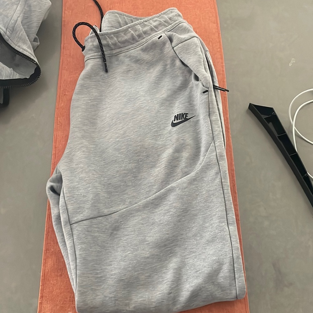 Nike Tech suit.